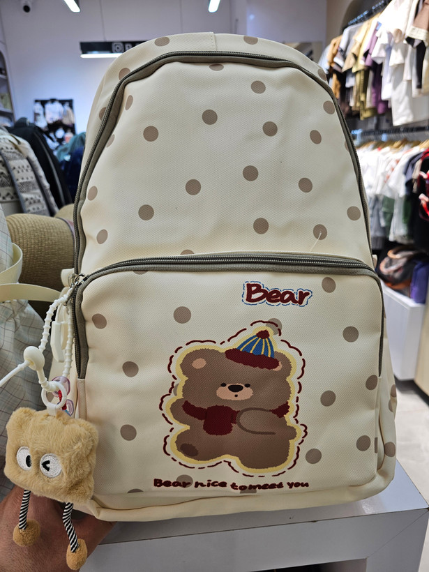 کوله پشتی خرسی Bear Dot کرم خالدار با آویز فانتزی